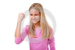 Emotion, success, gesture and people concept- young teenage girl celebrating victory,