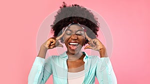 Emotional African Woman Shouting Touching Temples Posing On Pink Background