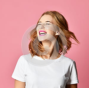 Emotional angry woman screaming shouting yelling closeup portrait on pink background