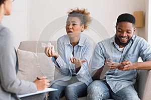 Emotional Black Wife Complaining Marital Psychologist About Husband Overusing Gadgets