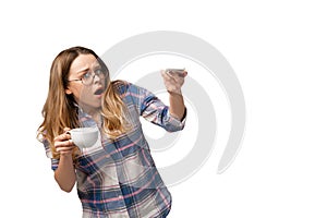 Emotional caucasian woman using smartphone isolated on white studio background, technologies. Scared, shocked