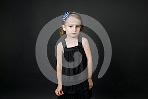 Emotional child with tears - a young girl crying, fine art portrait