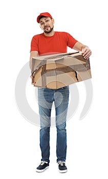 Emotional courier with damaged box on white background. Poor quality delivery service