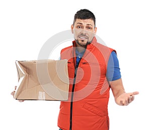 Emotional courier with damaged cardboard box on background. Poor quality delivery service