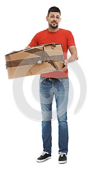 Emotional courier with damaged cardboard box on background. Poor quality delivery service