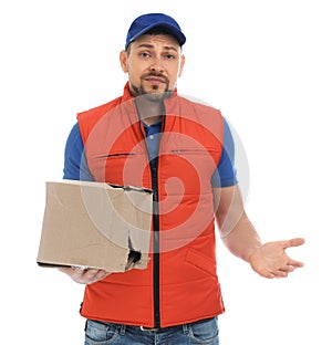 Emotional courier with damaged cardboard box on background. Poor quality delivery service