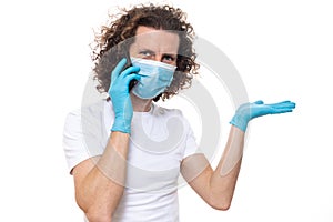 Emotional guy in medical mask and gloves. Pandemic coronavirus epidemic covid-19 quarantine isolated white