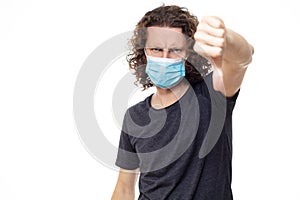 Emotional guy in medical mask. Pandemic coronavirus epidemic covid-19 quarantine isolated white