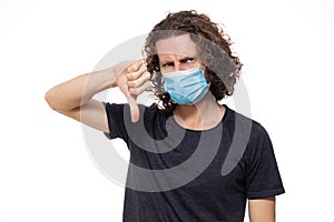 Emotional guy in medical mask. Pandemic coronavirus epidemic covid-19 quarantine isolated white