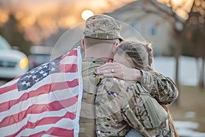 Emotional image capturing a soldier\'s homecoming on Memorial Day, reunited with his family, the American flag waving in the