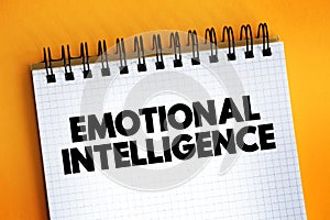 Emotional intelligence - ability to perceive, use, understand, manage, and handle emotions, text concept on notepad