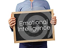 Emotional Intelligence issue depicted with child holding blackboard with text.