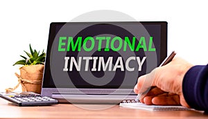 Emotional intimacy symbol. Concept words Emotional intimacy on beautiful black tablet. Beautiful white background. Calculator.