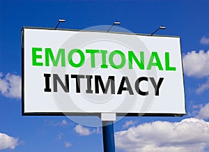 Emotional intimacy symbol. Concept words Emotional intimacy on beautiful white billboard. Beautiful blue sky white cloud