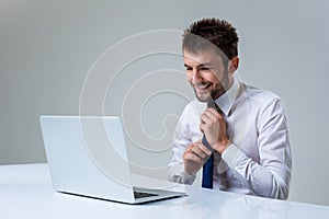 Emotional man and laptop