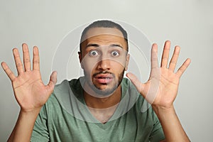 Emotional man stuck to transparent screen. Internet addiction concept