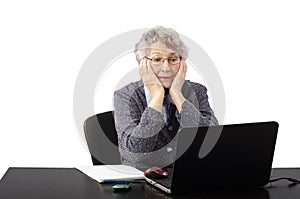 Old lady has unhappy skype conversation photo