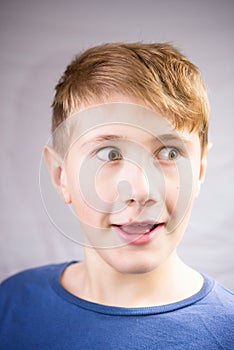 Emotional portrait of a 10-12 years boy.