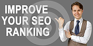 Emotional portrait of businessman showing right hand gesture on text - IMPROVE YOUR SEO RANKING. Gray background