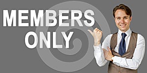 Emotional portrait of businessman showing right hand gesture on text - MEMBERS ONLY. Gray background