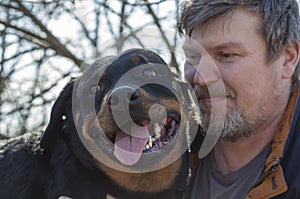 Emotional portrait of a grizzled man who misses his pet