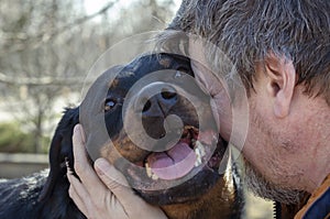 Emotional portrait of a grizzled man who misses his pet