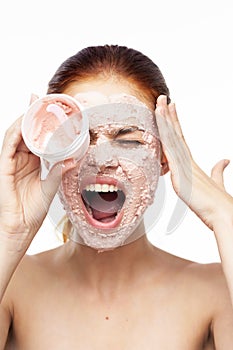 emotional woman cream face mask bare shoulders health