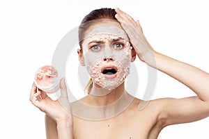 emotional woman cream face mask bare shoulders health