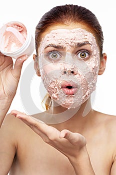 emotional woman cream face mask bare shoulders health