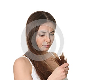 Emotional woman with damaged hair on white background.
