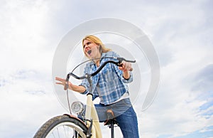 Emotional woman enjoy biking holidays. Lady cyclist with cruiser bike. Girl spend leisure riding bicycle. Latest news