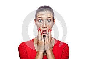 Emotional woman with red t-shirt and freckles.