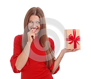 Emotional young woman with Christmas gift