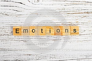 EMOTIONS word made with wooden blocks concept