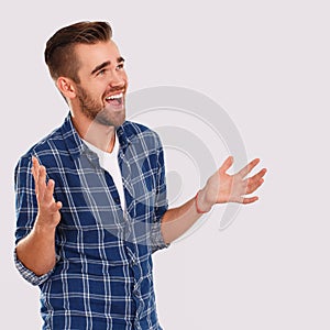 Emotions. Young man in blue shirt