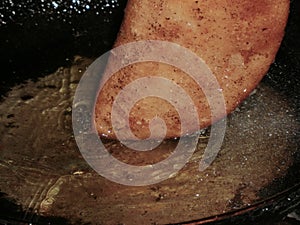 Empanada being fried