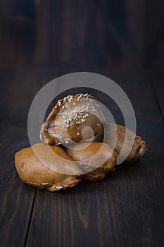 Empanadas - Argentine fried meat pies.wooden background