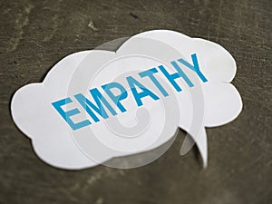 Empathy text on paper, life improvement