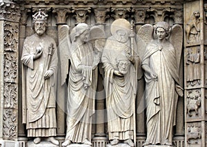 Emperor Constantine, an angel, Saint Denis holding his head, and another angel