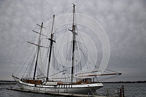 Empire Sandy tall ship moored at Toronto Harbourfront Centre wit