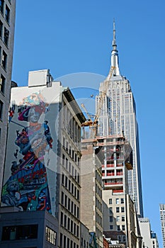 Empire State Building, and Mural, 5th Avenue, New York City, USA