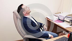 Employee accomplish project preparation take break lean on office chair.