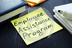 Employee assistance program EAP sign and pile of papers