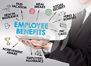 Employee Benefits Concept, young man holding a tablet computer