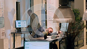 Employee catching coworker asleep