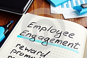 Employee engagement plan on a book. Engage workers