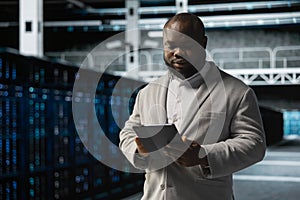 Employee fixing network issues affecting rigs performance