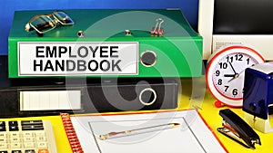 Employee handbook. Defines personnel practices and labor legislation. photo