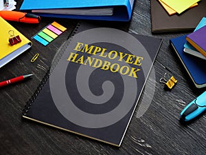 Employee handbook and papers with rules and procedures