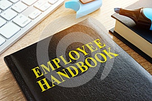 Employee handbook on a desk. photo